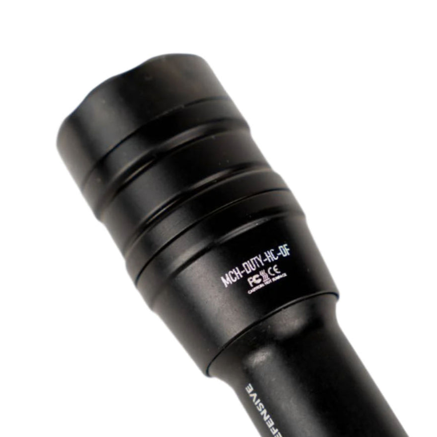 Close up of black flashlight head