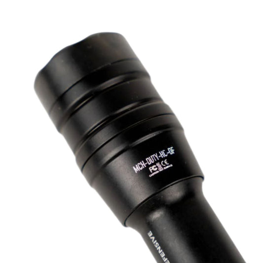 Close up of black flashlight head