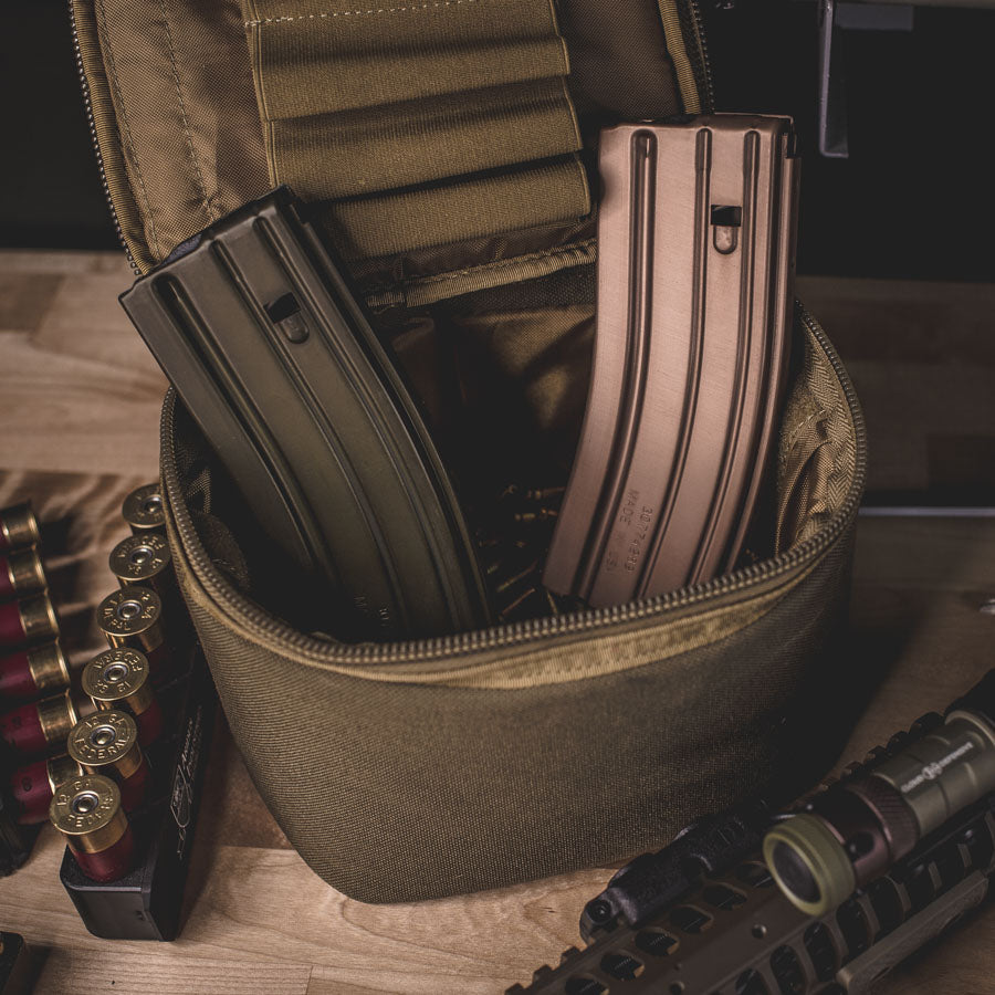 Two rifle magazines in an ammo bag.