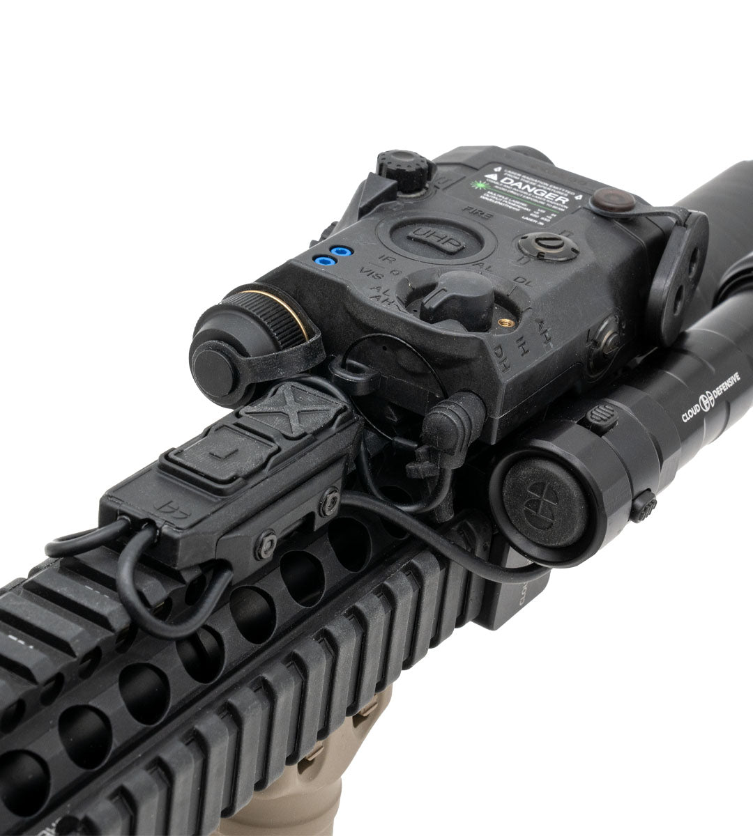 Close up of a Cloud defensive dual lead switch mounted to a rifle rail with an IR device plugged in.