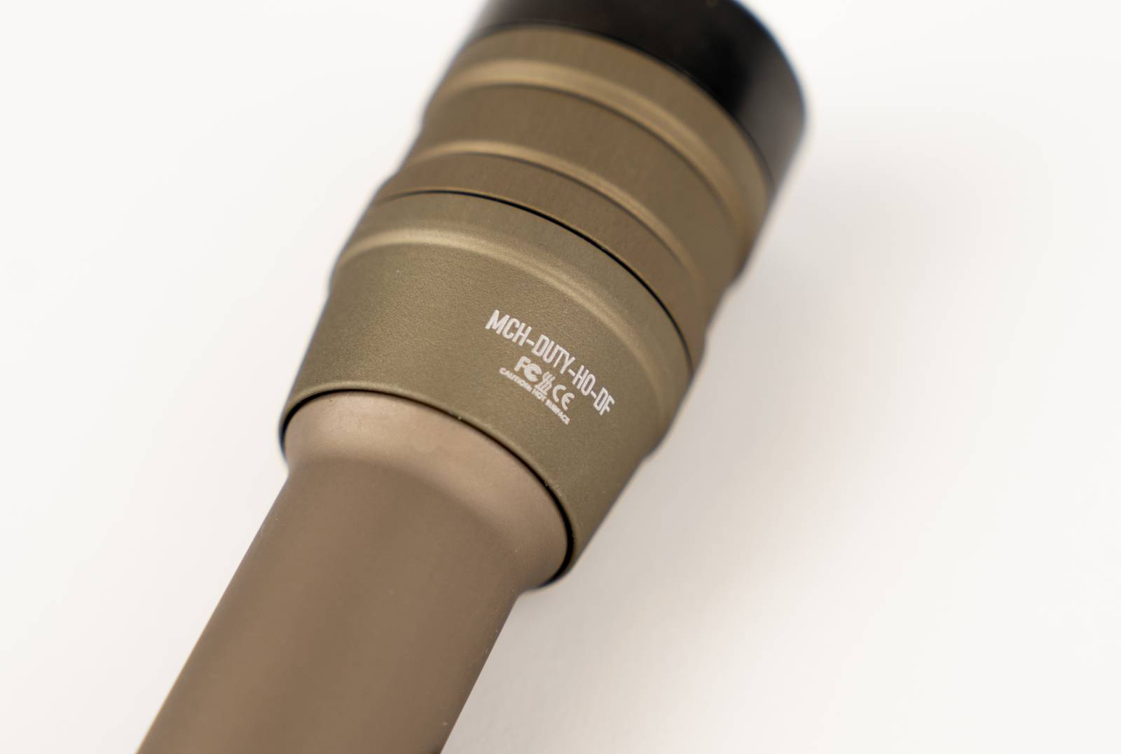 close up of FDE MCH Duty flashlight head